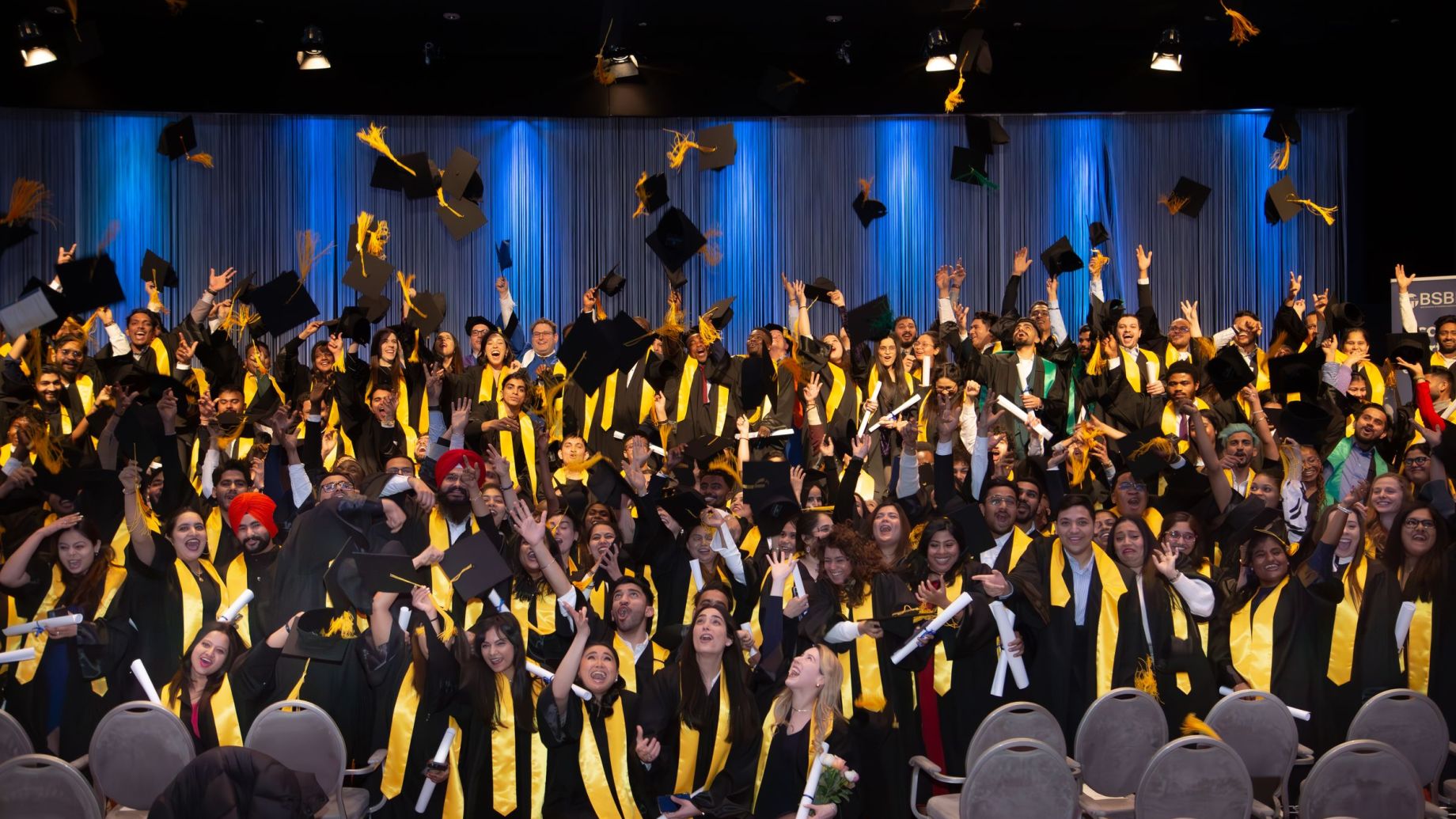 Students celebrating graduation